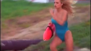 Pamela Anderson Sexy in Swimsuit – Baywatch