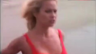 Pamela Anderson Rans in Swimsuit – Baywatch