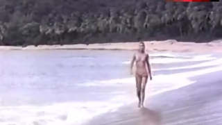 Mia Nygren Topless on Beach – Emmanuelle Iv