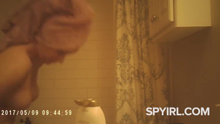 Big tits brunette after shower.spy cam