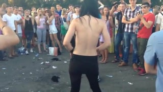 Drunk girl dancing topless in crowd