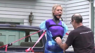 Girl gets wrapped hogtied in Saran wrap