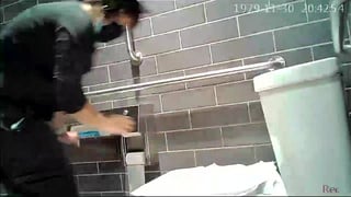 Mature coffee shop employee caught on the toilet