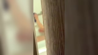 Spying on my sexy mom taking a bath