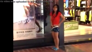 She masturbates in the middle of the street