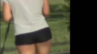 Girl Walking In Spandex Shorts