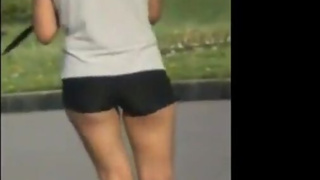 Girl Walking In Spandex Shorts