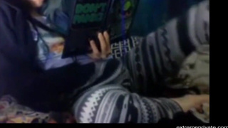 RAT webcam - Girl masturbates while reading a boo