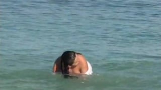Huge Tits playing on Public Beach (claim)