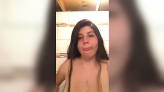 Chubby teen playing with big boobs and showing ass
