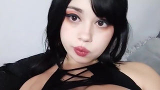 Goth teen showing big boobs