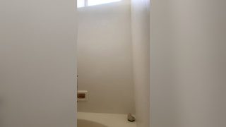 Amateur Periscope girl shows off body in shower