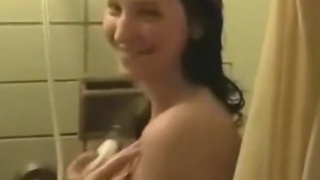 Woman greatly enjoys her shower