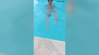 Italian girl streaming herself topless in backyard