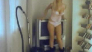 Girl washes her TV topless, as you do