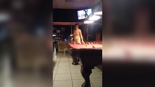Chubby MILF shoots pool nude in public pool hall