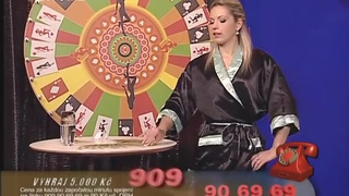 Russian host of televised quiz show strips fully