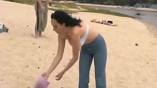 Hot wife strips nude a public beach in full view