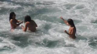 Group of girls first time getting topless at beach