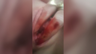 Nasty white bitch fingers bloody pussy