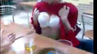 Teen flashes her big tits in the school cafeteria