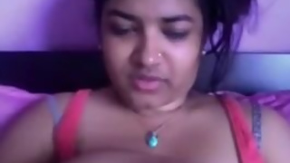 Indian Teen playing with Her Big Boobs on her webcam.flv