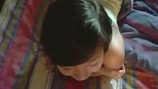 asian girl gives boyfriend blowjob