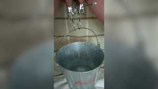 BDSM Pussy Labia Stretching Weight Torture Pissing in a Bucket Clamped Lips Urethral Play 1080p