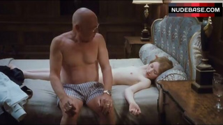 Emily Browning Lying Nude on Bed – Sleeping Beauty