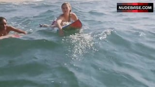 Sasha Jackson Ride on Surfboard in Bikini – Blue Crush 2